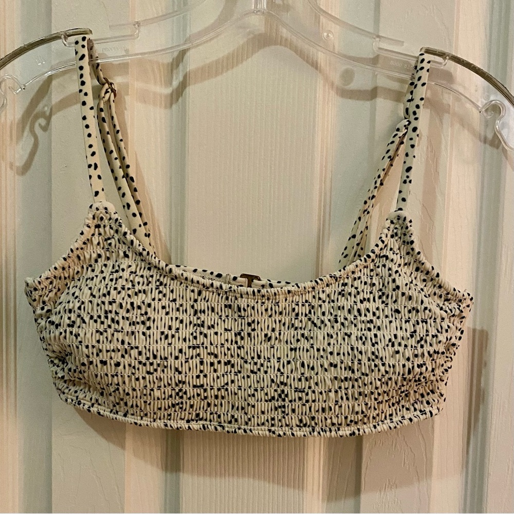 Bikini top, size L youth, off white with black spots